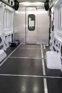 Installed custom Lonseal flooring and van bulkhead inside commercial van Installed custom Lonseal flooring and van bulkhead inside commercial van