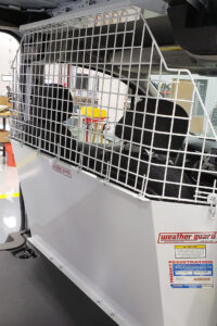 Installed Weather Guard custom bulkhead inside commercial van Installed Weather Guard custom bulkhead inside commercial van