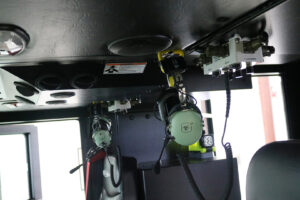 Two emergency vehicle David Clark headsets hang from the inside of an emergency vehicle Two emergency vehicle David Clark headsets hang from the inside of an emergency vehicle