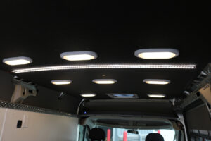 Work van with custom LED lights on roof of cabin Work van with custom LED lights on roof of cabin