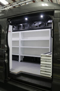 Weather Guard shelving and metal storage installed inside commercial van Weather Guard shelving and metal storage installed inside commercial van